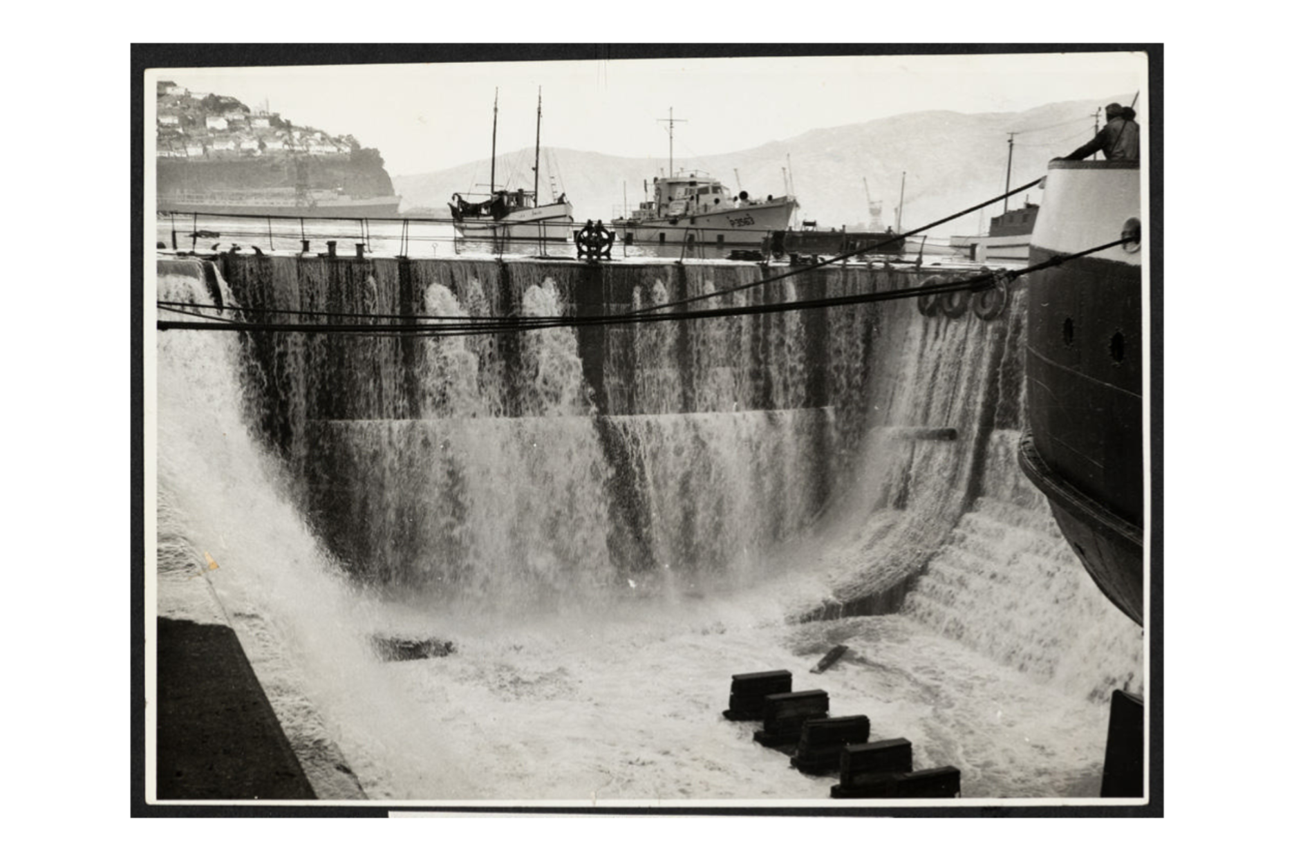Water pouring into the Graving Dock at Lyttelton Port during the 23 May 1960 Tsunami