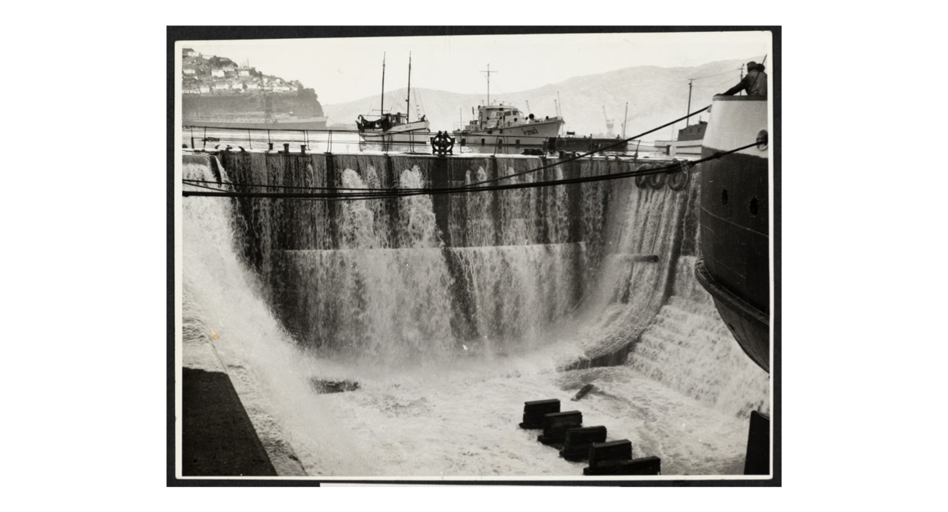 Water pouring into the Graving Dock at Lyttelton Port during the 23 May 1960 Tsunami